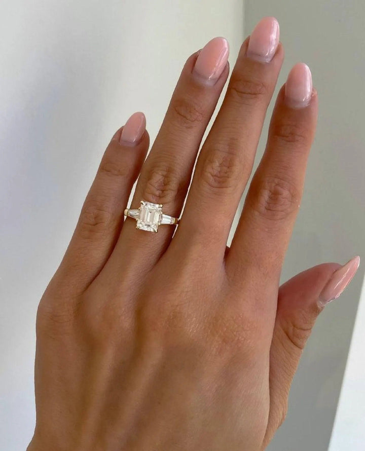 Emerald Cut Three Stone Rings: Match Beats Grade