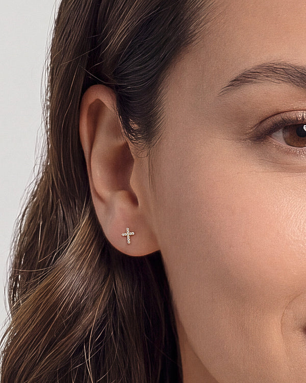 Cross Earrings: Forms, Meaning, and Why the Post Matters More Than on Any Other Motif