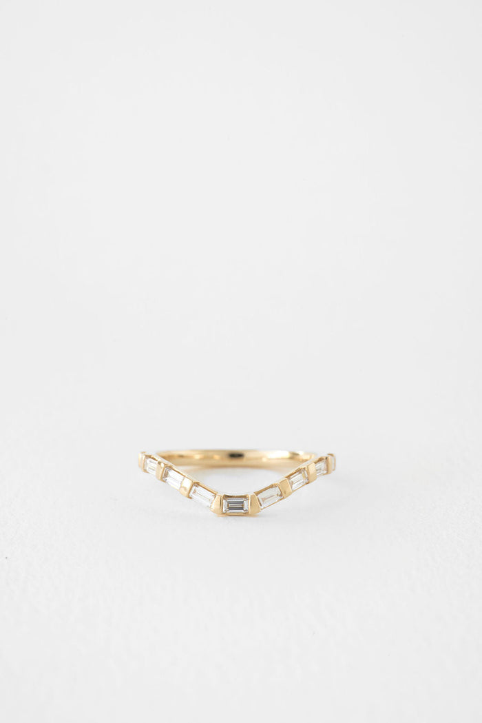 Baguette curved channel set moissanite wedding band
