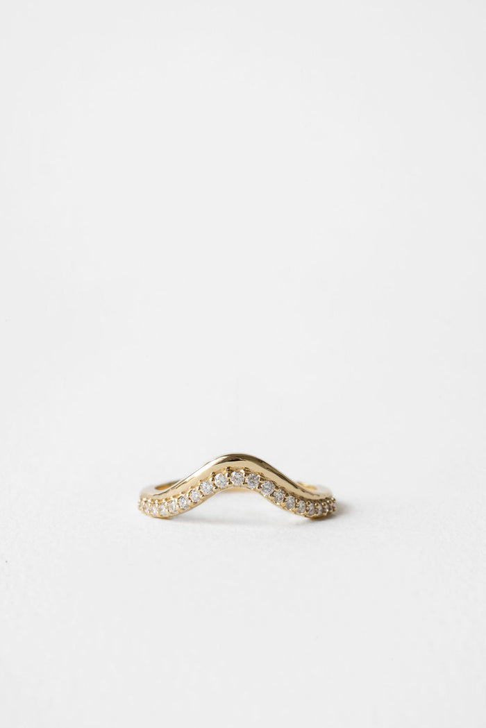 Round curved wave pave moissanite wedding band