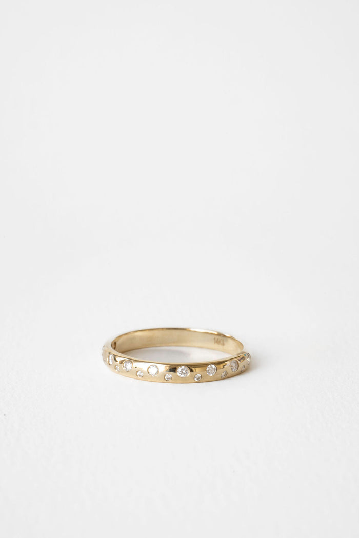 Round Moissanite Flush Set Wedding Band, view 1