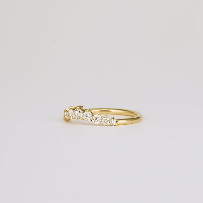 Round moissanite curved wedding band, side view