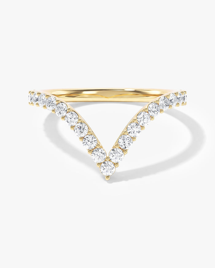 Round moissanite long curved V-shaped wedding band in yellow gold, front view