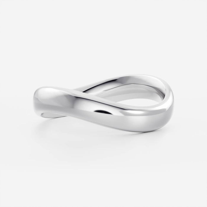 Plain curved wave wedding band in white gold, angled view