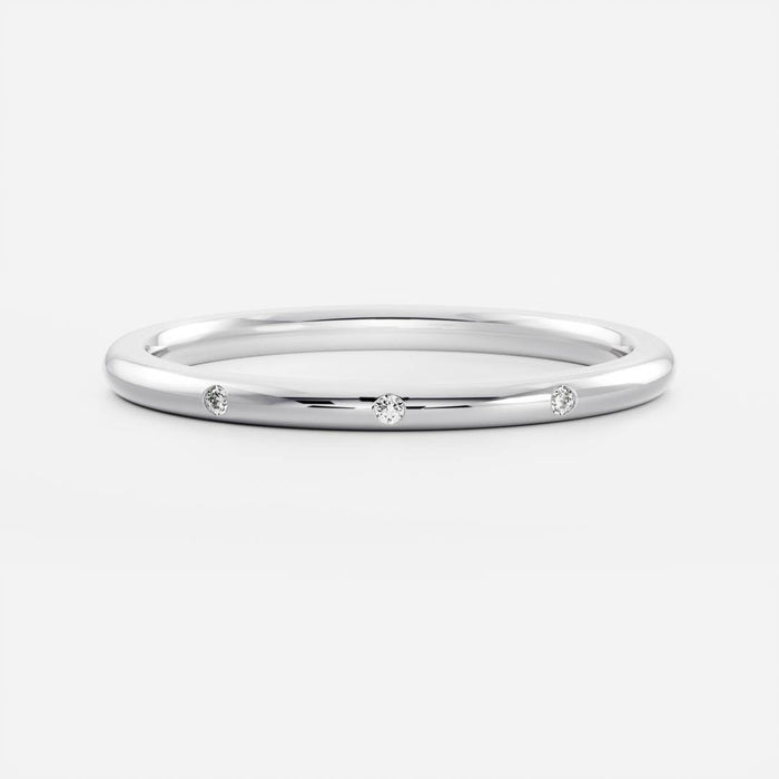 Round moissanite flush set wedding band in white gold, front view