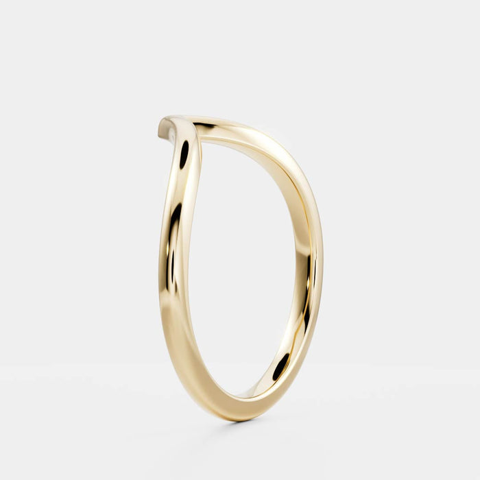 Plain curved V shaped wedding band in yellow gold, side view