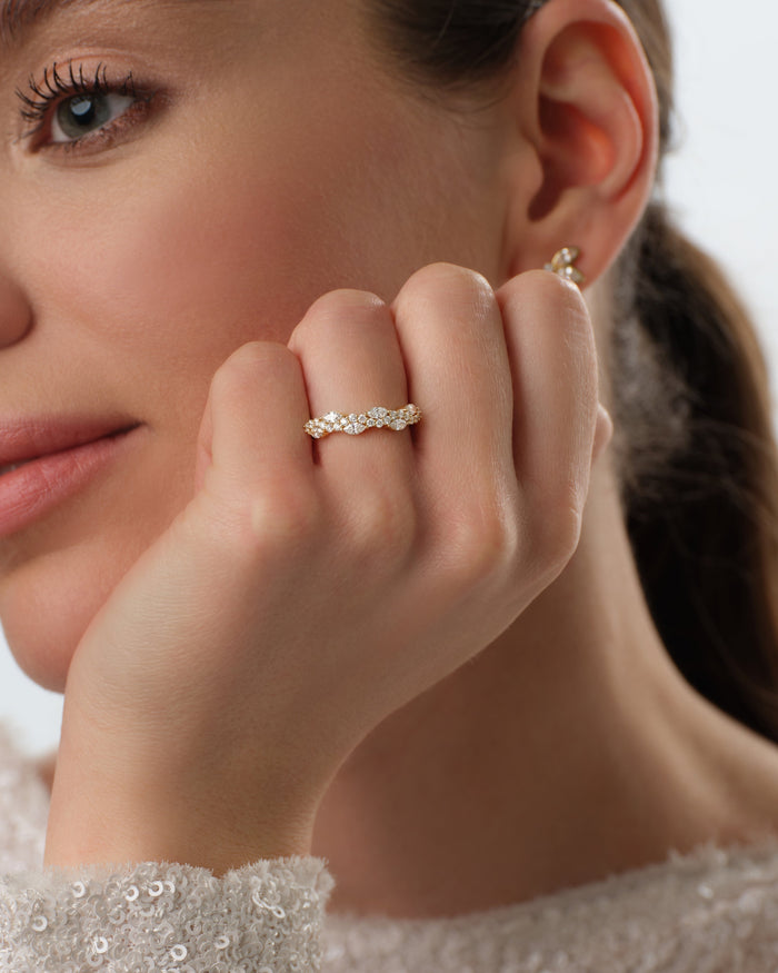 Marquise and round moissanite vine band worn on the hand