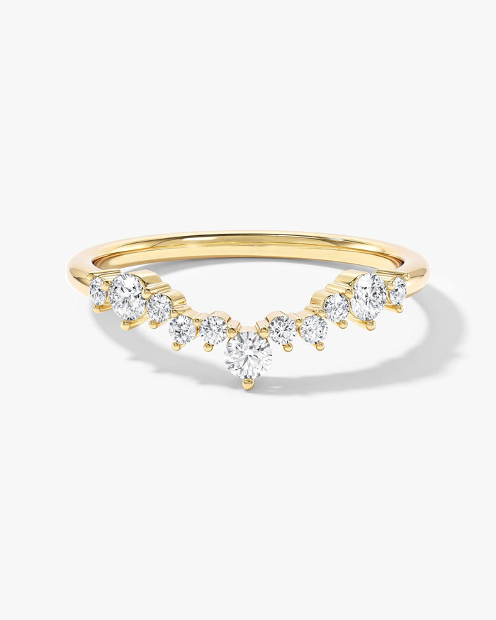 Chevron curved nesting wedding band with mixed size round moissanite in yellow gold, front view