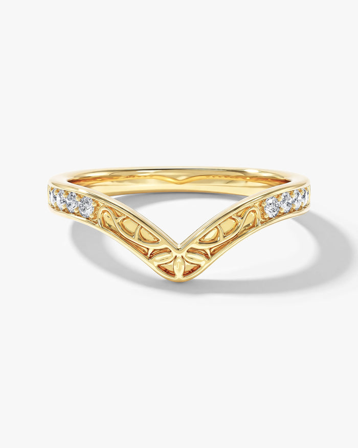 Filigree vintage curved nesting wedding band with round moissanite in yellow gold, front view