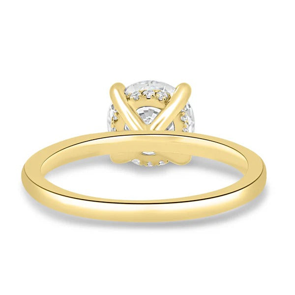Round cut lab grown diamond four claw solitaire ring with hidden halo