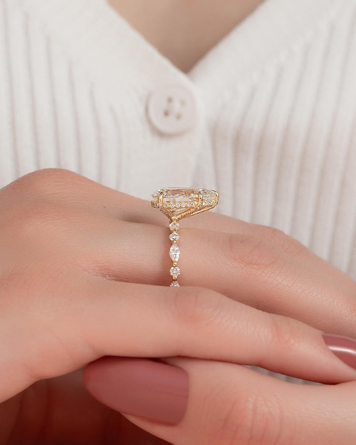 Floating accent stones spaced along the fine band