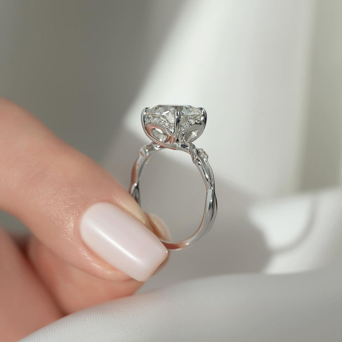 Side view of round moissanite floral halo vine band ring