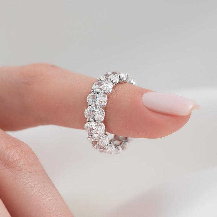 Oval moissanite full eternity band ring in white gold