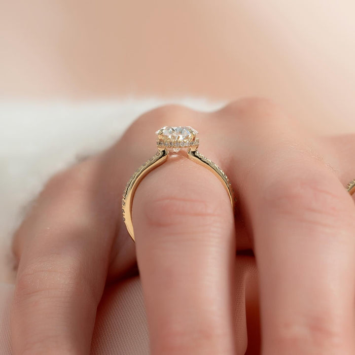 Oval moissanite hidden halo pave engagement ring