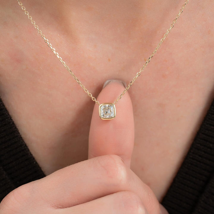 Oval moissanite bezel marquise accent ring on hand