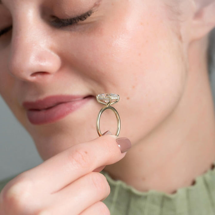 Oval moissanite hidden halo classic band ring detail
