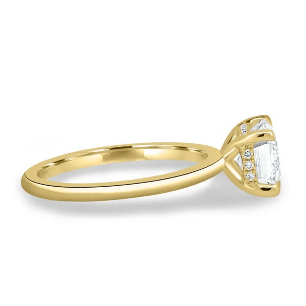 East west emerald cut lab grown diamond ring with hidden halo on a plain band
