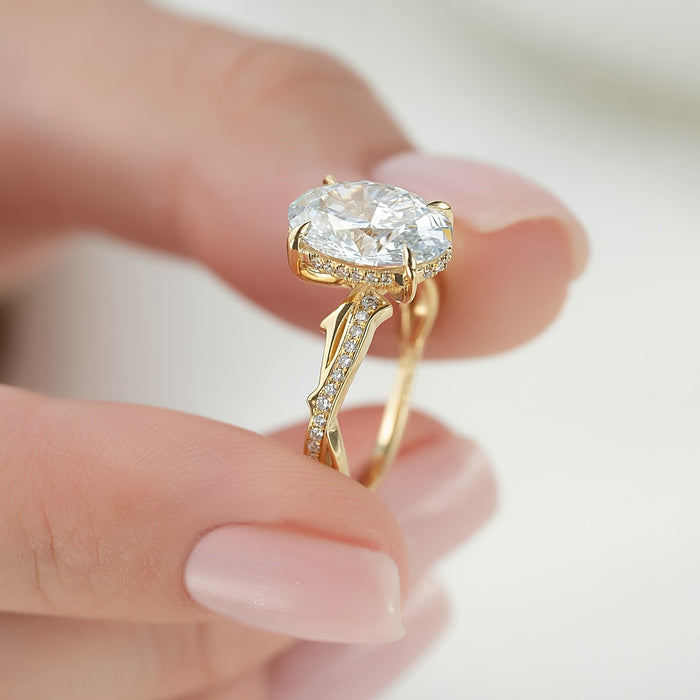 Oval lab grown diamond ring showing the two strands crossing beneath the setting
