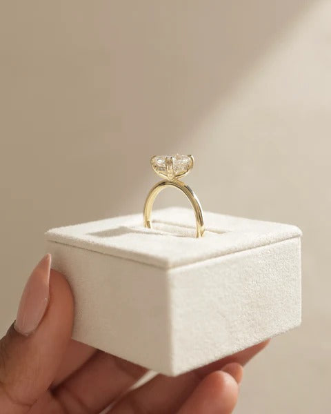 Elongated cushion diamond ring double tipped claw detail
