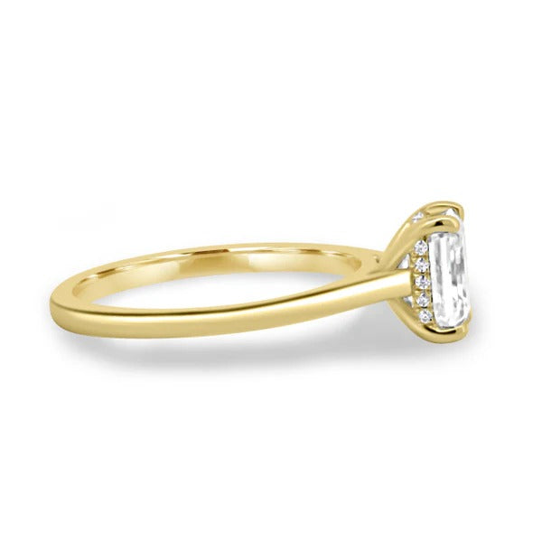 Emerald cut diamond cathedral shoulder detail