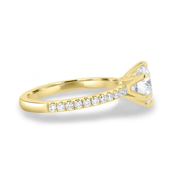 Round cut lab grown diamond six claw solitaire ring with pave band