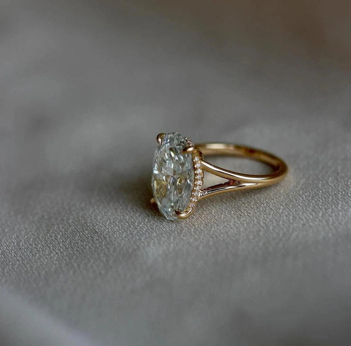 Oval moissanite split shank ring side profile in 14K yellow gold — Mapple Gems