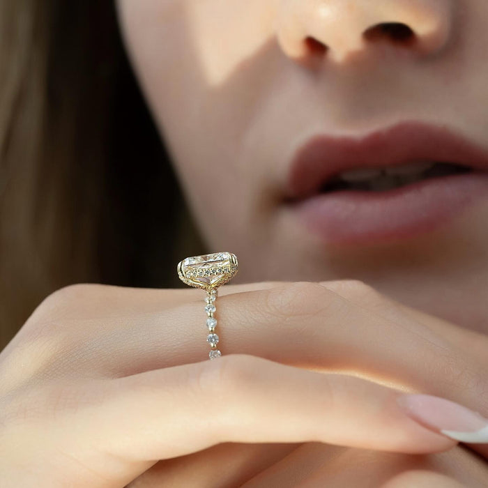 Profile showing the hidden halo beneath the elongated cushion and the spaced accent shank