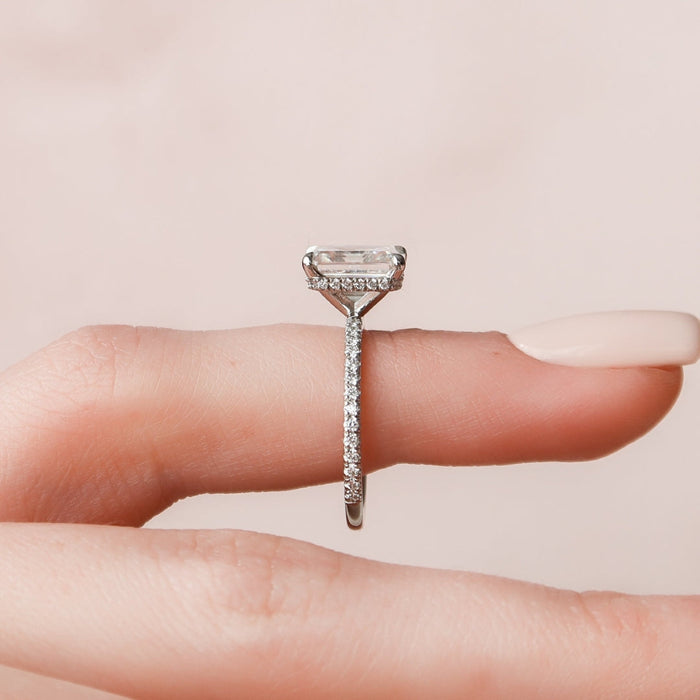 Emerald cut lab grown diamond ring, angled view showing the step cut facets