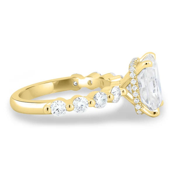 Rectangular hidden halo and graduated side stones in side profile