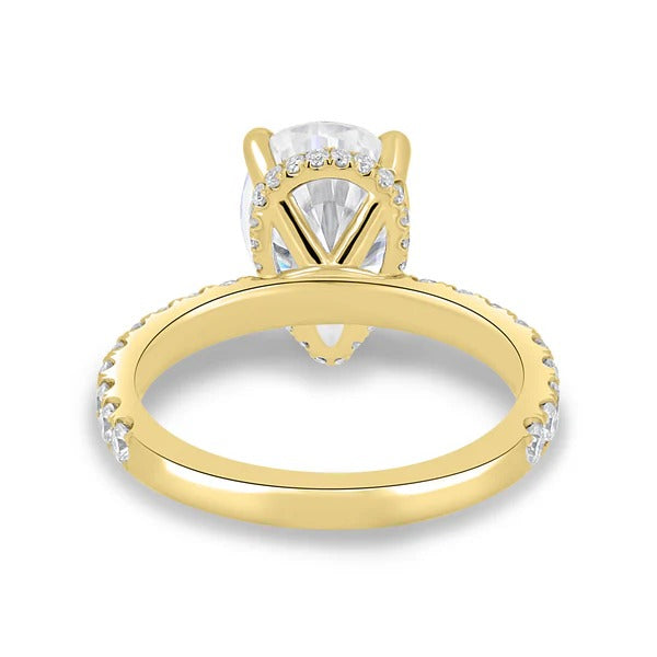 Three claw pear diamond hidden halo side profile