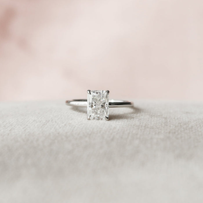 Radiant cut lab grown diamond handmade anniversary ring, angled view