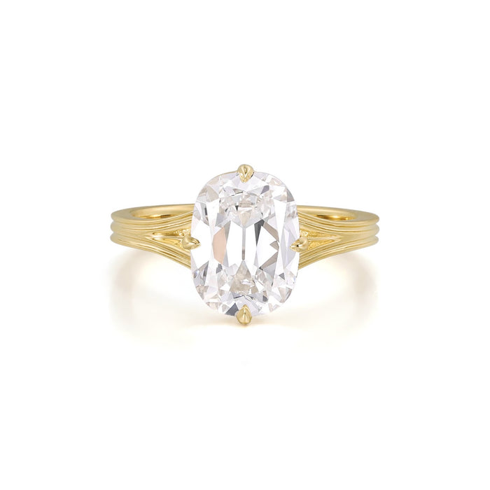 Old mine cut lab grown diamond solitaire on a fluted split shank in 14K yellow gold