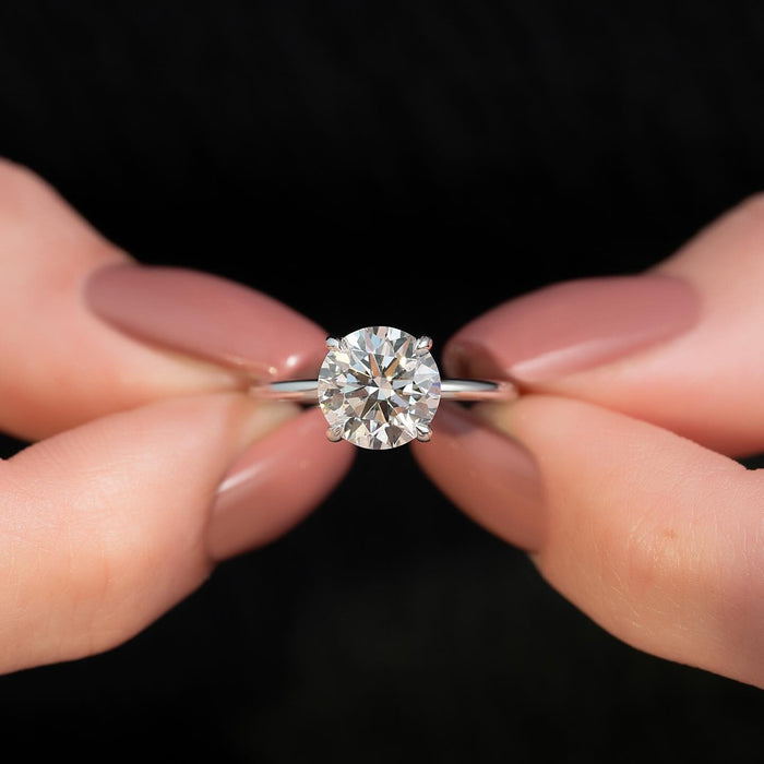 Round brilliant lab grown diamond on a knife edge white gold band