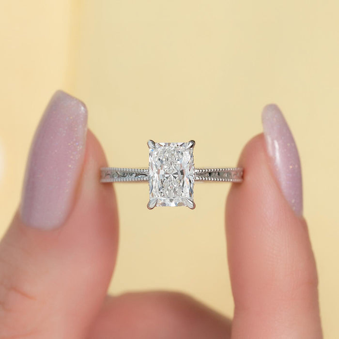 Radiant cut lab grown diamond ring on a hand engraved milgrain band in white gold, front view
