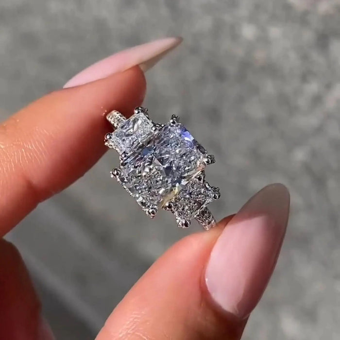 Radiant Cut Moissanite Three Stone Engagement Ring close-up โ Mapple Gems