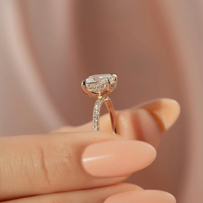 Cushion cut moissanite hidden halo ring side profile showing pave band in rose gold