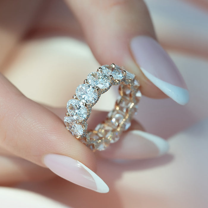 Oval Moissanite Hidden Halo Eternity Wedding Band stacked in 14K Gold