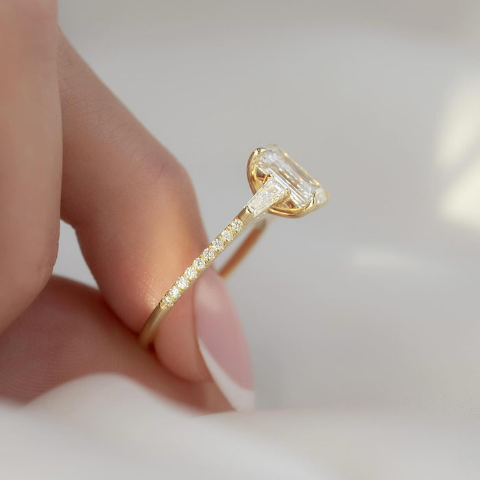 Emerald Cut Moissanite Three Stone Tapered Baguette Ring side view in 14K Gold