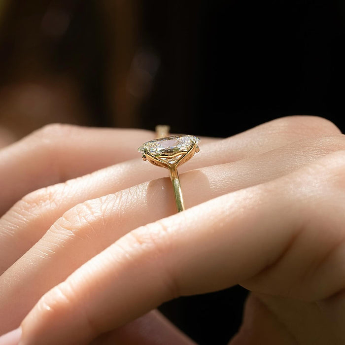 Oval Moissanite Hidden Halo Thin Band Solitaire Ring in 14K Gold