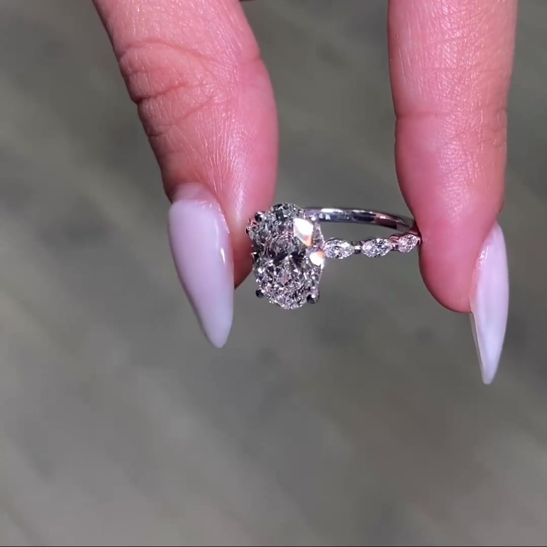 Elegant Marquise Side Accent Engagement Ring
