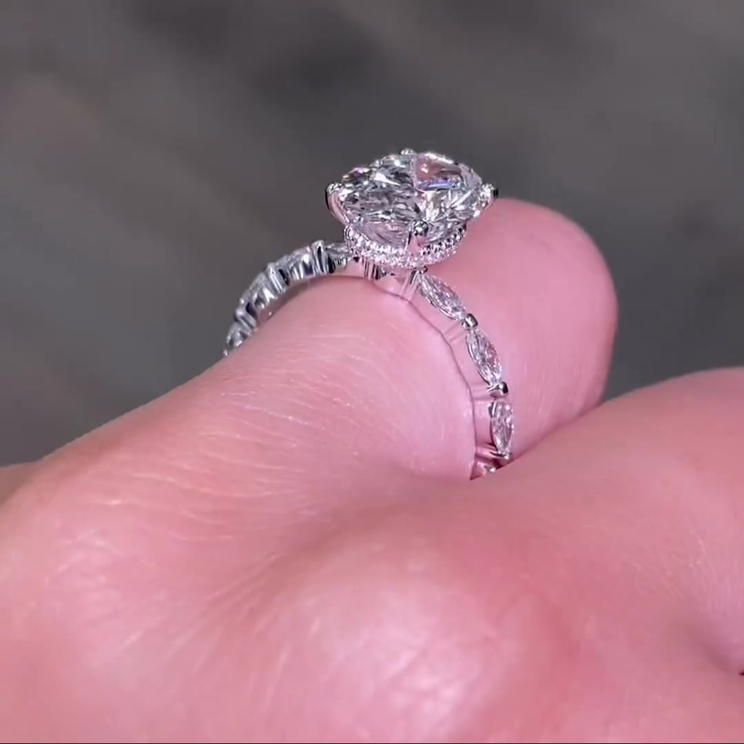 Gold Oval Cut Moissanite Ring with Side Stones