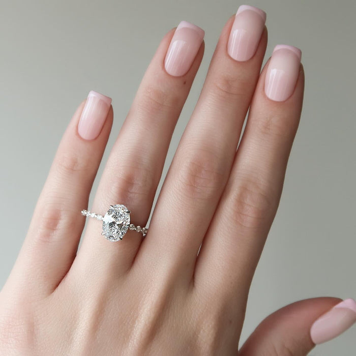Oval Moissanite Hidden Halo Shared Prong Accent Ring in 14K Gold