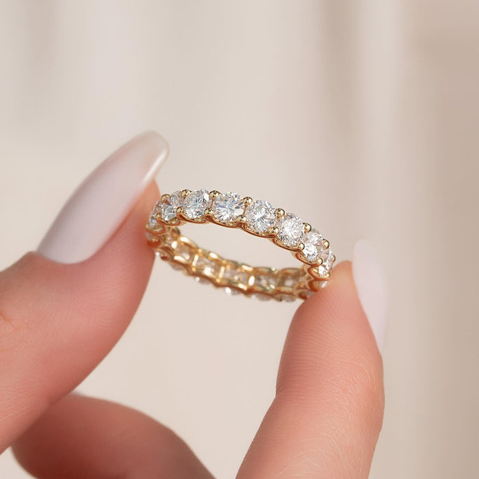 Round Cut Moissanite Shared Prong Eternity Band in 14K Gold — Mapple Gems