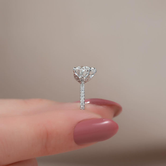 Heart cut moissanite hidden halo pave ring side profile in 14K white gold