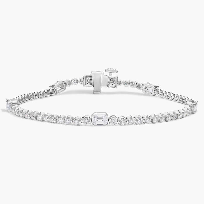 Round and emerald cut moissanite tennis bracelet in white gold