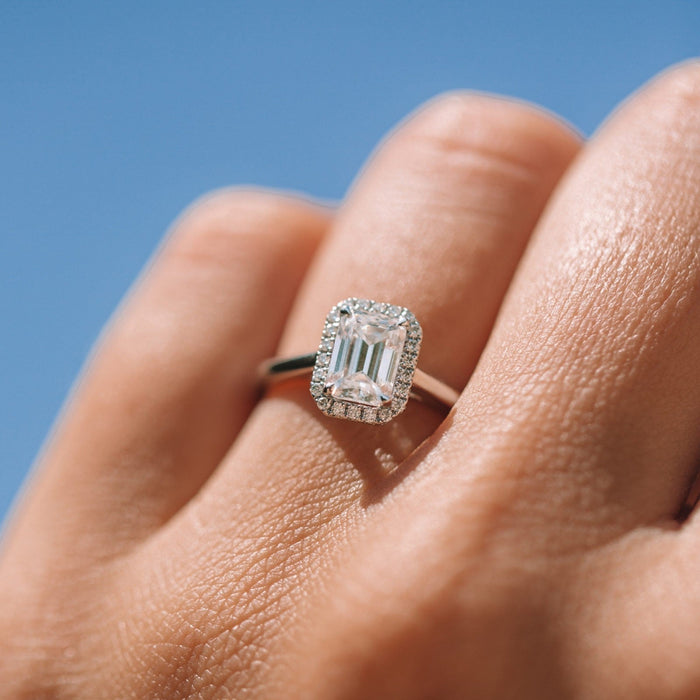 Emerald Cut Moissanite Four Prong Halo Engagement Ring 2 CT to 5 CT - front view 1