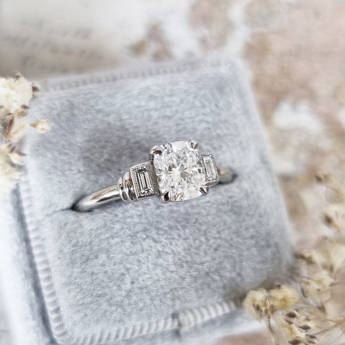 Top view of the cushion centre between two upright baguette diamonds