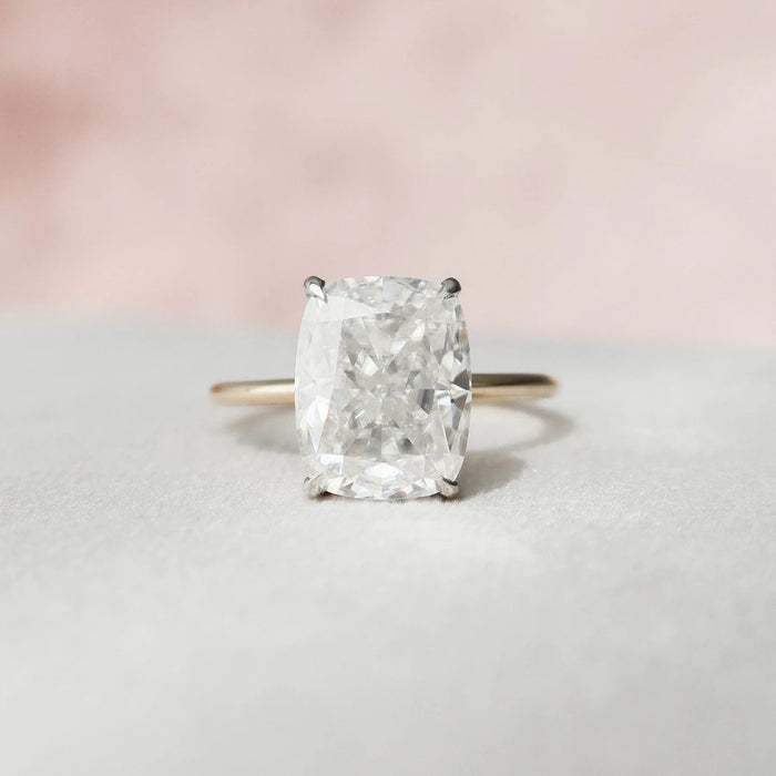 Solitaire elongated cushion cut moissanite engagement ring in gold