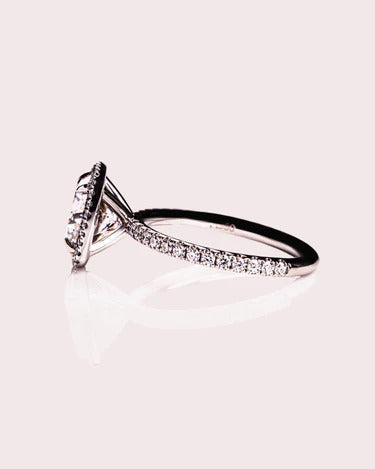 Vintage cushion moissanite halo anniversary ring, angled view