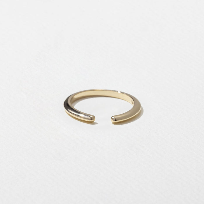 Plain open shank wedding band in yellow gold
